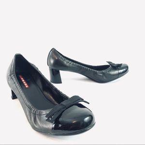 Prada Ozi Nappa Vernice black cap toe bow heels 8